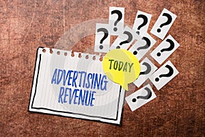 Handwriting text Advertising Revenue. Business overview money media earn from selling advertising space or time Progress