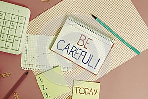 Handwriting text Be Careful. Concept meaning making sure of avoiding potential danger mishap or harm Writing equipments