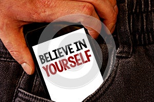 Handwriting text Believe In Yourself. Concept meaning Determination Positivity Courage Trust Faith Belief Brown jeans back pocket