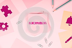 Handwriting text Benchmarking. Business overview Evaluate something by comparison with a standard Strategy