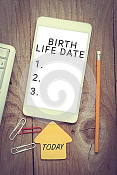 Handwriting text Birth Life Date. Business overview Make a movement do something different new strategies Tablet With