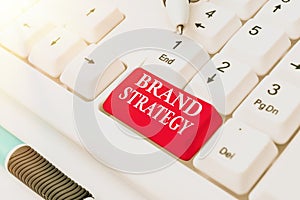Handwriting text Brand Strategy. Business showcase longterm plan executed for the development of a good product Posting