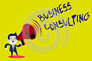 Handwriting text Business Consulting. Concept meaning Blends Practice of Academic Theoretical Expertise Man in Suit Earpad photo