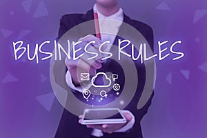 Handwriting text Business Rules. Concept meaning a specific directive that constrains or defines a business Lady