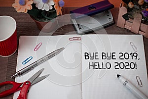 Handwriting text Bye Bye 2019 Hello 2020. Concept meaning saying goodbye to last year and welcoming another good one.