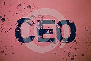 Handwriting text Ceo. Concept meaning Chief Executive Officer Head Boss Chairperson Chairman Controller Ideas messages pink backgr