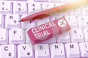 Handwriting text Clinical Trial. Business overview evaluate the effectiveness and safety of medications Editing New