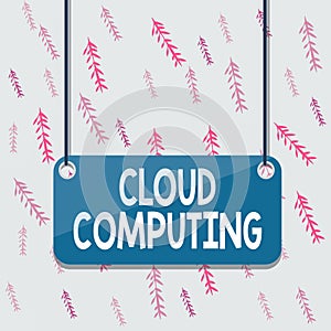 Handwriting text Cloud Computing. Concept meaning use a network of remote servers hosted on the Internet Board color background