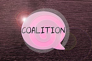Handwriting text Coalition. Word for a temporary alliance of distinct parties, persons, or states for joint action