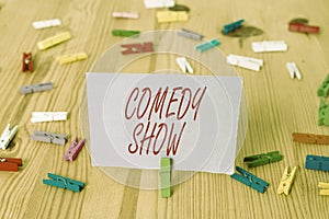 Handwriting text Comedy Show. Concept meaning Funny program Humorous Amusing medium of Entertainment Colored clothespin