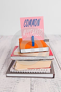 Handwriting text Common Mistakes Question. Concept meaning repeat act or judgement misguided making something wrong pile