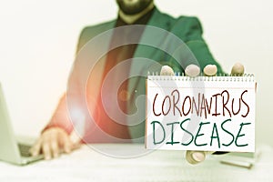 Handwriting text Coronavirus Disease. Word Written on defined as illness caused by a novel virus SARSCoV2 Lawyer photo