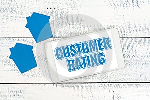 Handwriting text Customer Rating. Business idea Each point of the customers enhances the experience Contacting Buyers