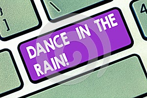 Handwriting text Dance In The Rain. Concept meaning Enjoy the rainy day childish activities happy dancing Keyboard key
