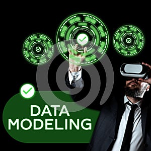 Writing displaying text Data Modeling. Concept meaning process of transferring data between data storage systems