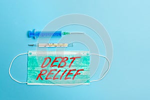 Handwriting text Debt Relief. Concept meaning partial or total remission of it especially those by countries Primary