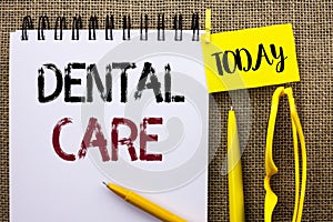 Handwriting text Dental Care. Concept meaning Oral Tooth Mouth Caring Safety Hygiene Protection Regulations written on Notebook Bo photo