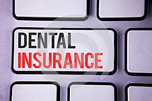 Handwriting text Dental Insurance. Concept meaning Dentist healthcare provision coverage plans claims benefit written on white key