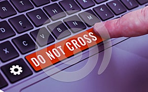 Handwriting text Do Not Cross. Business overview Crossing is forbidden dangerous caution warning not to do it photo