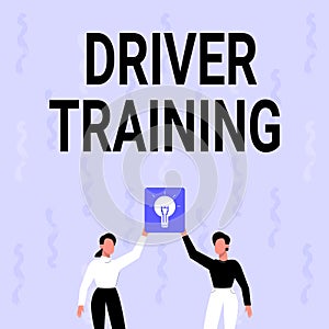 Handwriting text Driver Training. Word Written on prepares a new driver to obtain a driver s is license Two Colleagues