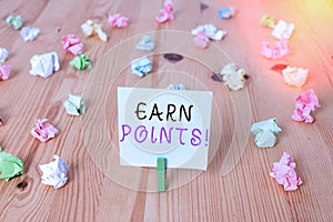 Handwriting text Earn Points. Concept meaning collecting scores in order qualify to win big prize Colored crumpled