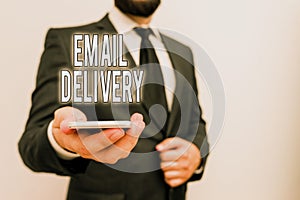 Handwriting text Email Delivery. Concept meaning a type delivery in which tickets are delivered electronically Male human wear