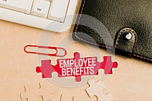 Handwriting text Employee Benefits. Business idea indirect and noncash compensation paid to an employee Building An photo