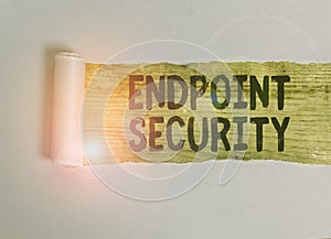 Handwriting text Endpoint Security. Concept meaning the methodology of protecting the corporate network Cardboard which is torn in