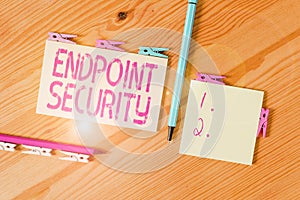 Handwriting text Endpoint Security. Concept meaning the methodology of protecting the corporate network Colored clothespin papers