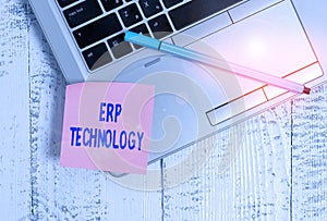 Handwriting text Erp Technology. Concept meaning the integrated management of main business processes Trendy slim silver metallic