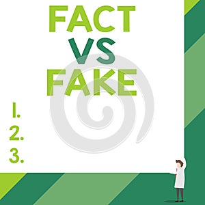 Handwriting text Fact Vs Fake. Concept meaning Rivalry or products or information originaly made or imitation Front view photo