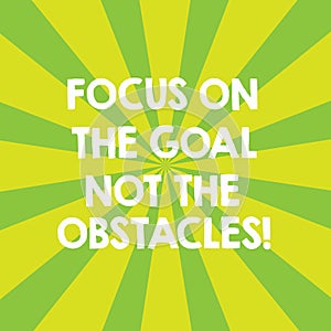 Handwriting text Focus On The Goal Not The Obstacles. Concept meaning Be determined to accomplish objectives Sunburst photo Two