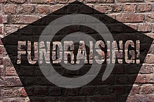 Handwriting text Fundraising. Concept meaning Seeking of financial support for charity cause or enterprise Brick Wall