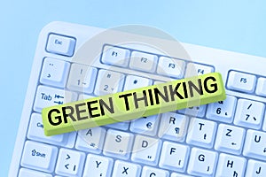 Handwriting text Green Thinking. Business overview Taking ction to make environmental responsibility a reality Typing