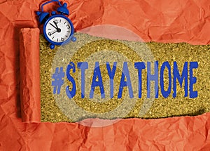 Handwriting text Hashtag Stay at home. Concept meaning a trending label in social media related to the coronvirus