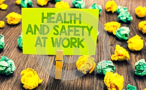 Handwriting text Health And Safety At Work. Concept meaning Secure procedures prevent accidents avoid danger Paperclip retain writ