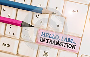 Handwriting text Hello I Am In Transition. Concept meaning Changing process Progressing planning new things White pc
