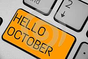 Handwriting text Hello October. Concept meaning Last Quarter Tenth Month 30days Season Greeting Keyboard orange key