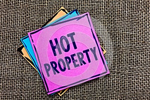 Handwriting text Hot Property. Concept meaning Something which is sought after or is Heavily Demanded Paper notes Important remind