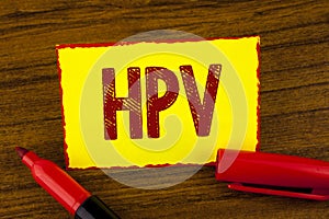 Handwriting text Hpv. Concept meaning Human Papillomavirus Infection Sexually Transmitted Disease Illness written on Yellow Sticky