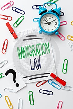 Handwriting text Immigration Law. Business idea national statutes and legal precedents governing immigration Creative