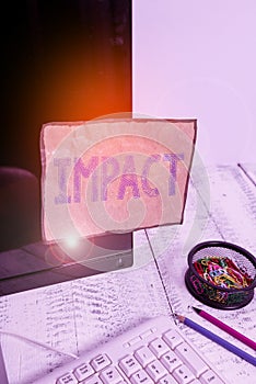 Handwriting text Impact. Concept meaning action of one object coming forcibly into contact with another Note paper taped to black photo