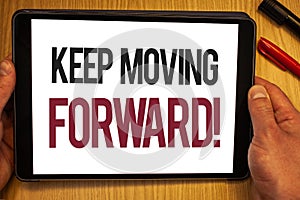 Handwriting text Keep Moving Forward Motivational Call. Concept meaning Optimism Progress Persevere Move Hand hold showing colorfu