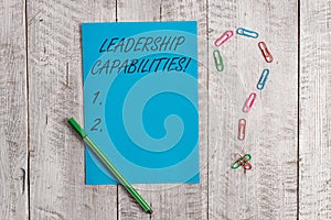 Handwriting text Leadership Capabilities. Concept meaning Set of Perforanalysisce Expectations a Leader Competency photo