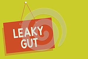 Handwriting text Leaky Gut. Concept meaning A condition in which the lining of small intestine is damaged Red board wall message c