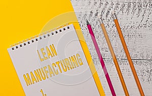 Handwriting text Lean Manufacturing. Concept meaning Waste Minimization without sacrificing productivity Blank spiral notepad