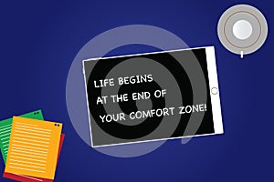 Handwriting text Life Begins At The End Of Your Comfort Zone. Concept meaning Make changes evolve grow Tablet Empty Screen Cup