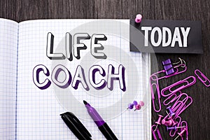 Handwriting text Life Coach. Concept meaning Mentoring Guiding Career Guidance Encourage Trainer Mentor written on Notebook Book o