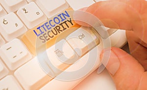 Handwriting text Litecoin Security. Concept meaning peertopeer cryptocurrency and opensource software