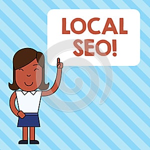 Handwriting text Local Seo. Concept meaning incredibly effective way to market your near business online Woman Standing